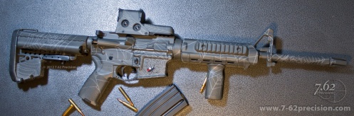 AR-15 Rifle in Gray Spider Web pattern with Red Tail spider on magazine well. Magpul MOE handguards and fore grip, EOTech Sight, VLTOR Stock.