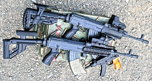vz.58 rifles with accessories, including SA-58 handguard, VFR-VZ Rail System, AG-58 Grips, UAS Folding Stock and Folding Recoil-Compensating Stock System with GL-SHOCK and Cheekpeice. Optics are Mepro M21 and Mepro TRU-DOT RDS. 