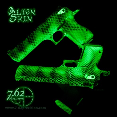Twin Desert Eagle pistols in a glow in the dark Alien Skin finish.