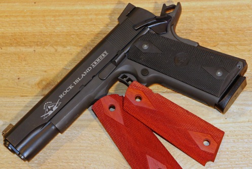 Before: A stock parkerized 1911 was degreased given wood grips, and coated with DuraBlue and DuraBlue Nitre.